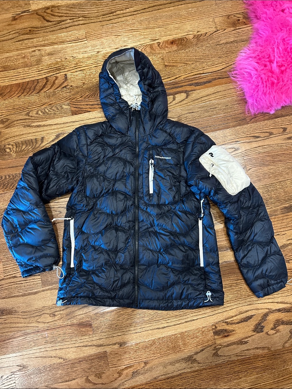 Peak Performance Black Hooded Puffer Jacket with Contrast Cream Accents